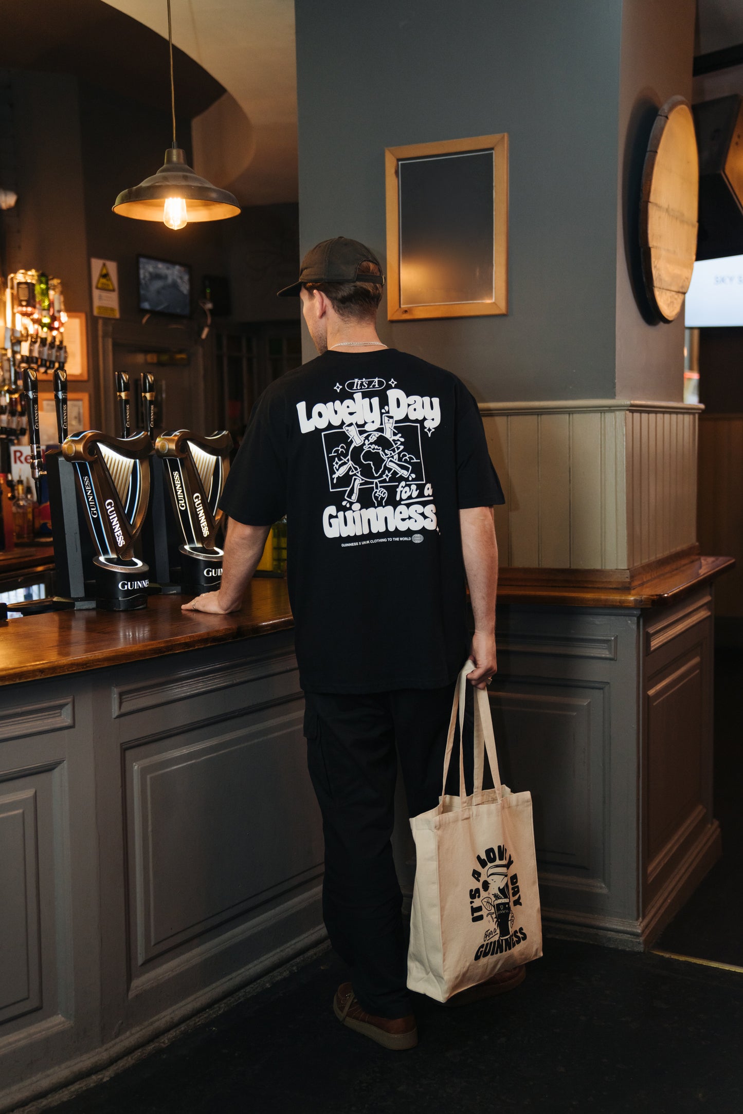 Guinness x UN:IK 'Worldwide' Tee - Black