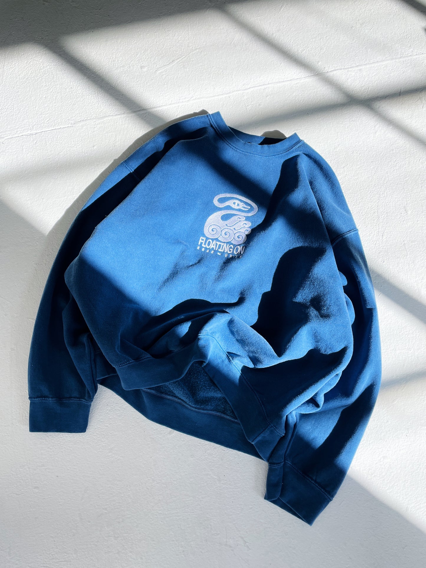 KBAR X UN:IK 'Floating On' Vintage Washed Sweater - Blue