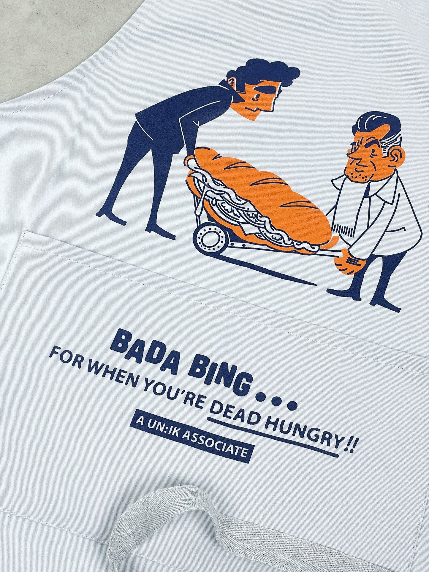 Bada Bing x UN:IK 'Dead Hungry' Apron - Grey